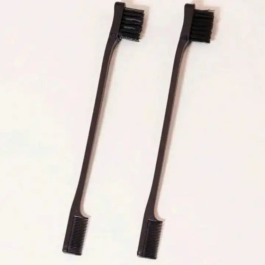 Two black toothbrushes with bristle heads on a white background