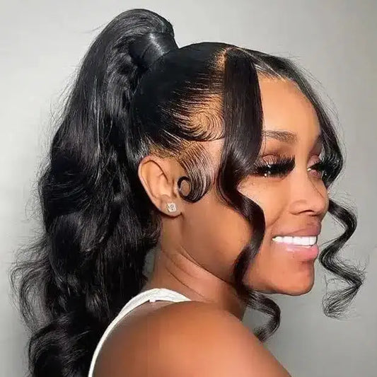 Woman with styled hair in a ponytail against a gray background