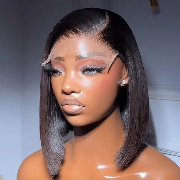 Mannequin head with a wig on a plain background