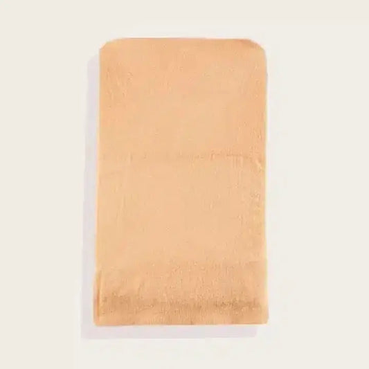 Beige towel on a white background