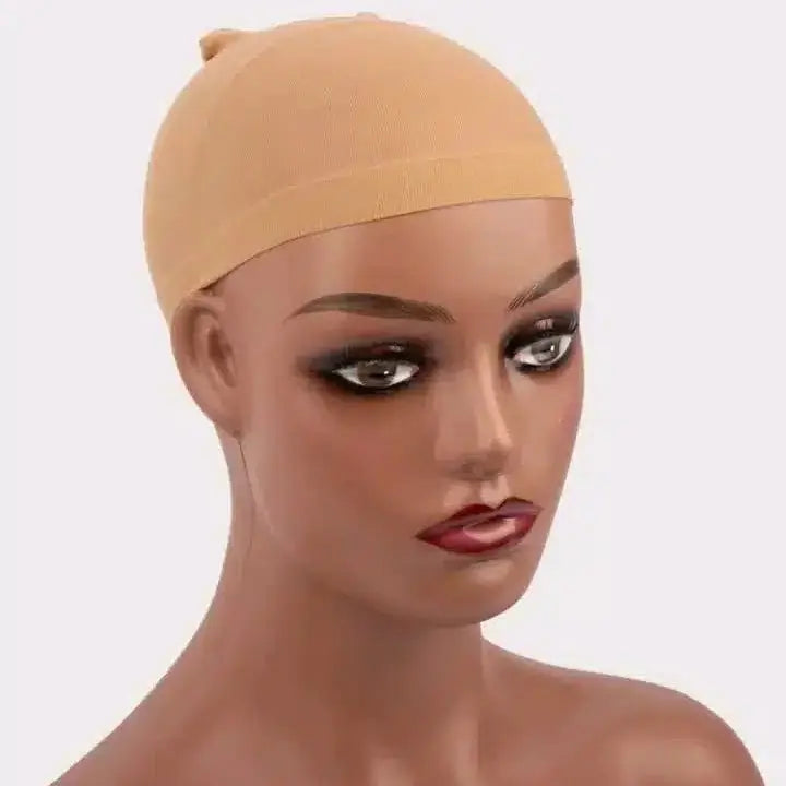 Mannequin head wearing a beige hair bonnet on a white background